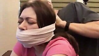 Bound and tape gagged slut gets fucked on the table