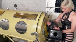 Latex gimp in the Iron Lung